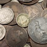 One-hundred year old coins from around the world.